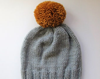 Bobble Hat in Light Grey Chunky Yarn with Mustard Pom Pom