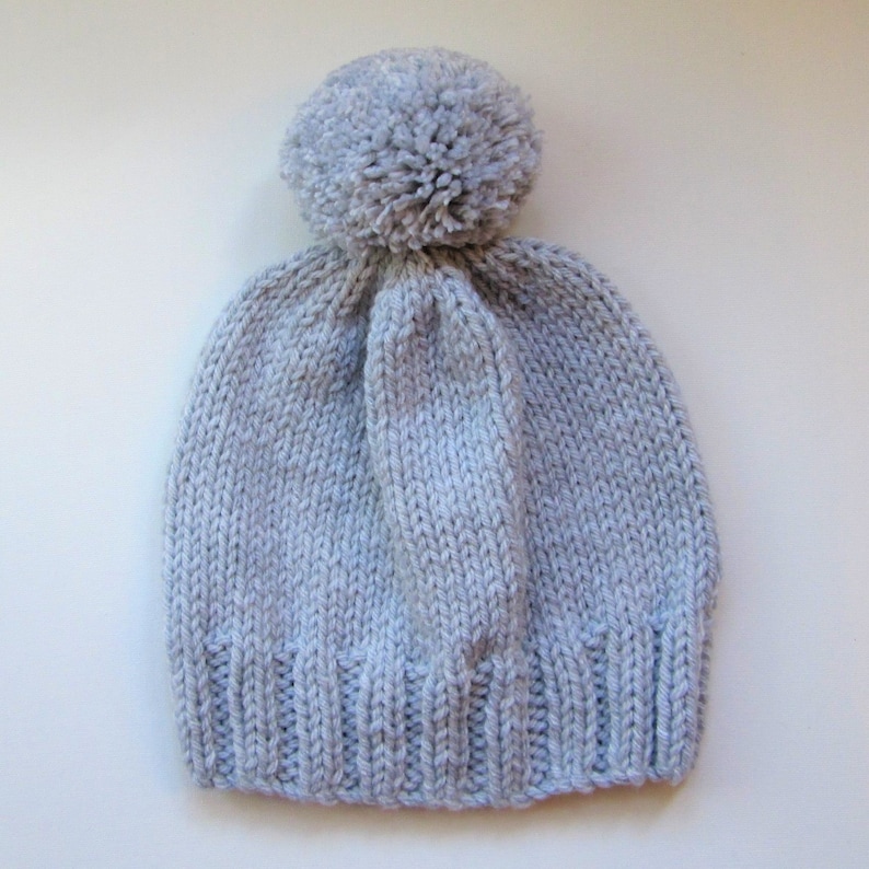 pale blue bobble hat