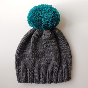 Bobble Hat in Mid Grey Chunky Yarn with Petrol Green Pom Pom