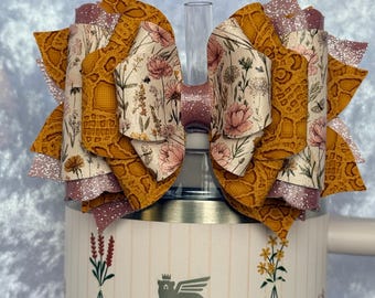 Pink shimmer and yellow floral tumbler bow