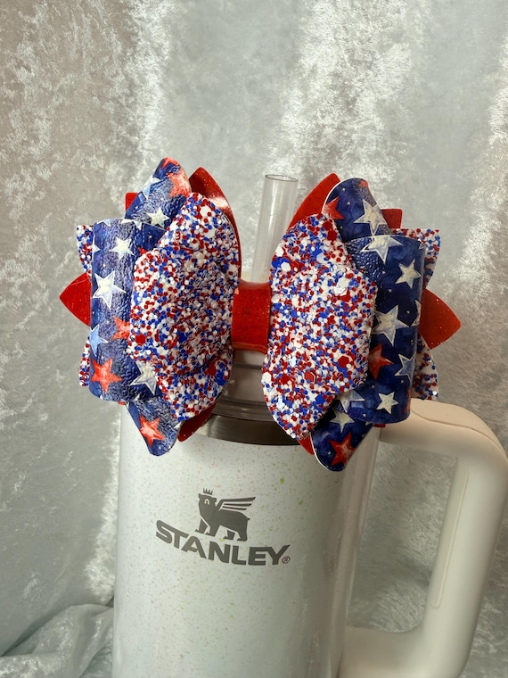 Blue, red, and white starts and glitter faux leather tumbler bow