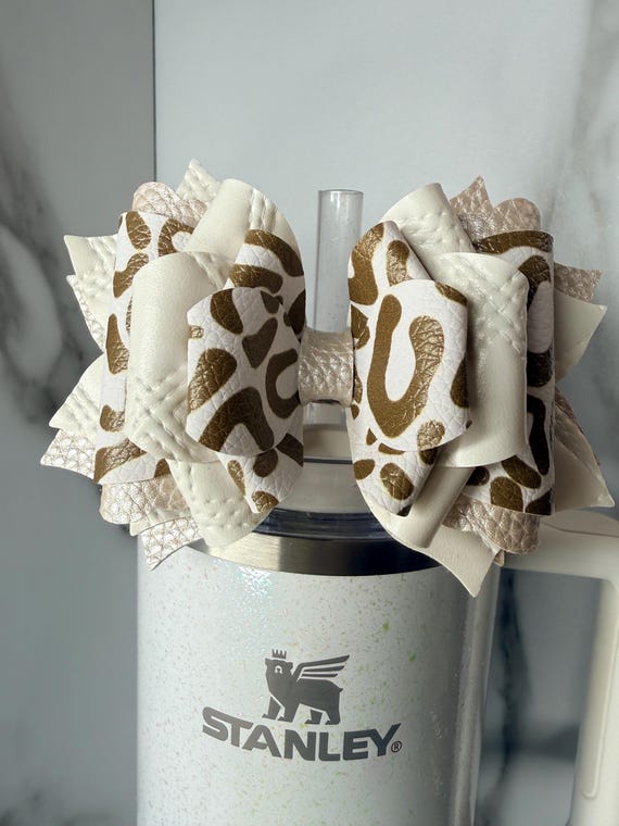 White leopard tumbler bow