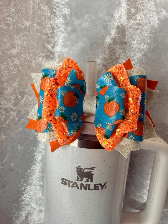 Orange glitter peaches tumbler bow