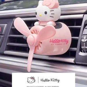 Kitty figurine rotating car air freshener