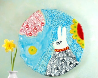 Ceramic wall hanging art plate, Handmade Clay Wall Platter, Colorful folk art style home decor, Rabbit and Flowers  by Cathy Kiffney