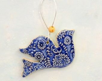 Ceramic Bird Ornament, handmade garden art, bird decoration, wall hanging bird  with copper wire hook and blue bead