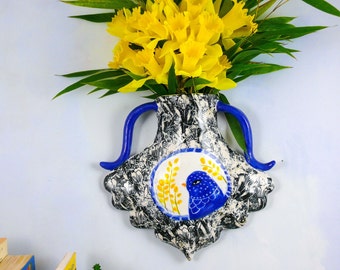 Artful Ceramic Wall Vase, creative home decor, Unique Wall hanging pottery for dried flowers, cute bird and floral design on a ceramic pot