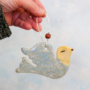 Ceramic Bird Ornament, handmade garden art, bird decoration, wall hanging bird  with copper wire hook and wooden bead. Christmas ornament