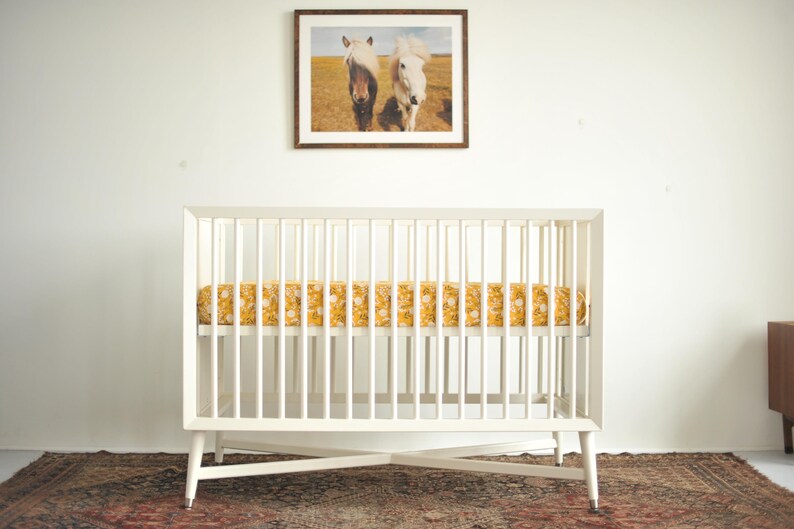 mustard yellow crib sheet