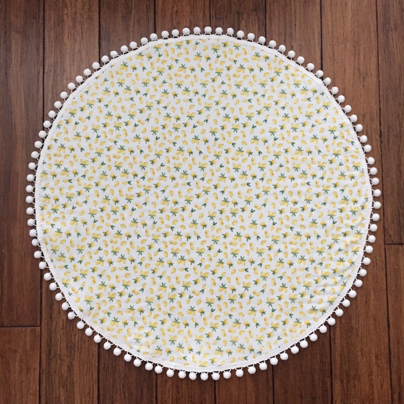 round quilted play mat