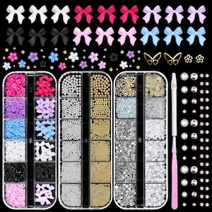 May include: A collection of nail art supplies, including bows, flowers, beads, sequins, and rhinestones in various colors. The set includes a white pen and pink tweezers for application. Perfect for DIY nail art.