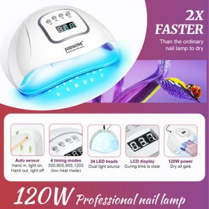 K&ouml;nnte beinhalten: Eine wei&szlig;e professionelle JODSONE-Nagellampe mit blauem LED-Licht. Merkmale sind ein LCD-Display, ein Autosensor und 4 Zeitmodi. Die Lampe wird mit 120W beworben und trocknet alle Gele. Der Text besagt, dass sie 2x schneller ist.