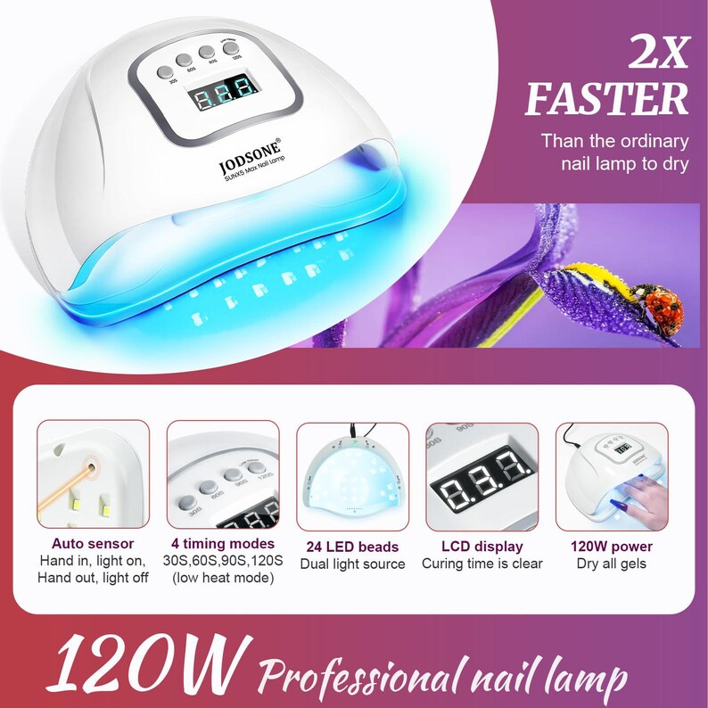 K&ouml;nnte beinhalten: Eine wei&szlig;e professionelle JODSONE-Nagellampe mit blauem LED-Licht. Merkmale sind ein LCD-Display, ein Autosensor und 4 Zeitmodi. Die Lampe wird mit 120W beworben und trocknet alle Gele. Der Text besagt, dass sie 2x schneller ist.