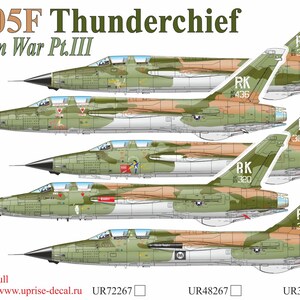 May include: An illustration of several F-105F Thunderchief fighter jets in a camouflage pattern. The image includes text that reads "F-105F Thunderchief Vietnam War Pt.III". Each jet has different markings and numbers, including "RK 436", "RU 301", "RM 311", "RK 320", and "RE 319".