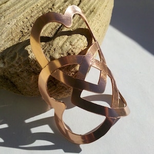 Infinite Love Head Badge