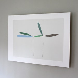 May include: A minimalist art print featuring a stylized abstract design of five leaves in shades of green, blue, and brown. The leaves are connected by thin lines, creating a delicate and balanced composition.
