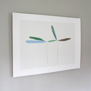 May include: A minimalist abstract art print featuring a stylized plant with green, blue, and brown leaves on a white background.