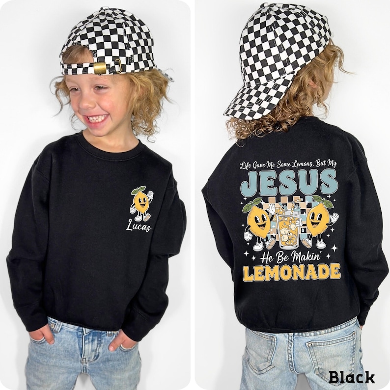 Personalized Jesus Lemonade Shirt with happy lemon graphics and the quote “Life Gave Me Some Lemons, But My Jesus He Be Makin’ Lemonade” — cute faith based kids sweatshirt and Christian shirt.