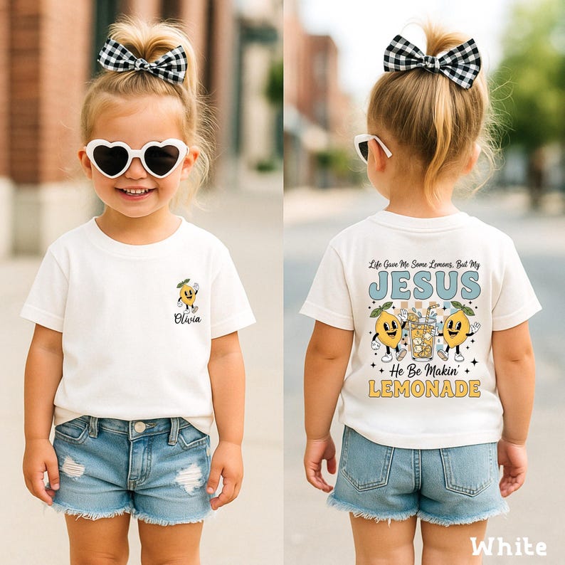 Personalized Jesus Lemonade Shirt with happy lemon graphics and the quote “Life Gave Me Some Lemons, But My Jesus He Be Makin’ Lemonade” — cute faith based kids sweatshirt and Christian shirt.