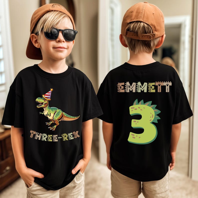 Dinosaur-themed family birthday shirts including a Three Rex or Four Rex kids tee with name and age on back, plus matching Mama Saurus, Dada Saurus, and sibling designs — ideal for dinosaur birthday parties.Dinosaur-themed family birthday shirts including a Three Rex or Four Rex kids tee with name and age on back, plus matching Mama Saurus, Dada Saurus, and sibling designs — ideal for dinosaur birthday parties.