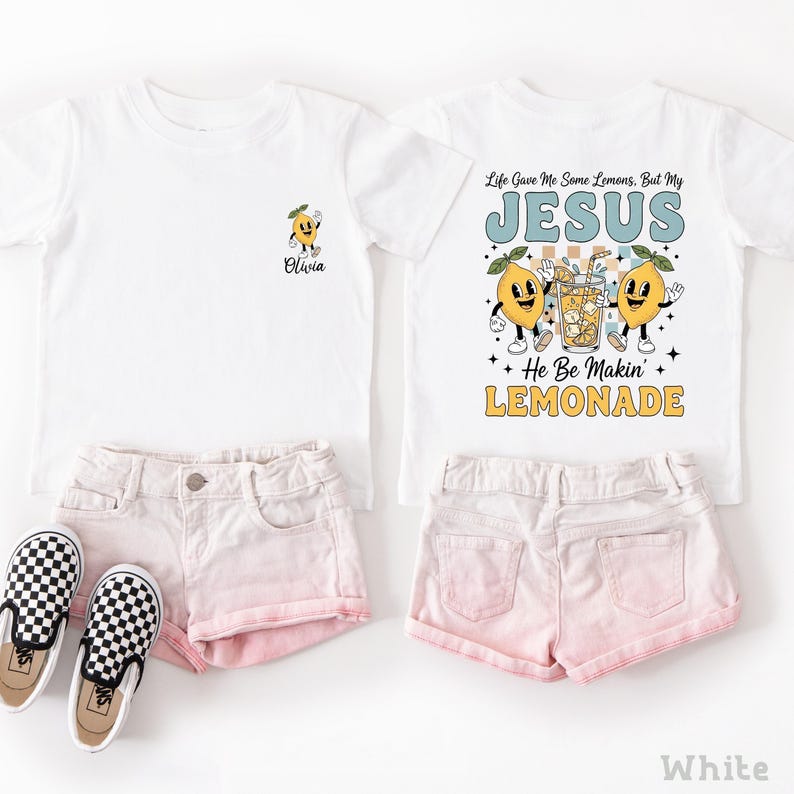 Personalized Jesus Lemonade Shirt with happy lemon graphics and the quote “Life Gave Me Some Lemons, But My Jesus He Be Makin’ Lemonade” — cute faith based kids sweatshirt and Christian shirt.