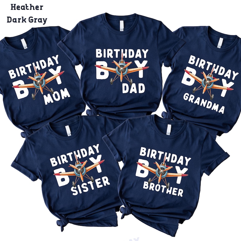 five navy blue t-shirts with white text that reads "Birthday Boy" and "Birthday Mom" printed on them.