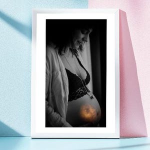 Personalized art for pregnant women, montage with ultrasound on the belly, visual tribute to the bond between mother and baby before birth