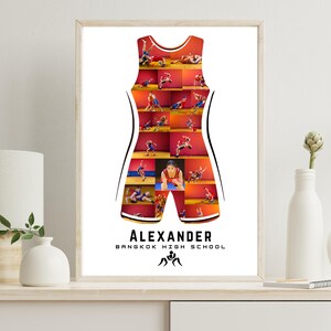 May include: A framed print featuring a wrestling singlet design. The singlet is filled with action shots of wrestlers in various poses. The print includes the name "ALEXANDER" and "BANGKOK HIGH SCHOOL" in black text, along with a wrestling graphic.