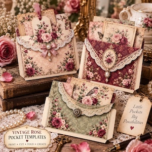 May include: Three decorative paper pockets featuring vintage floral patterns, lace-trimmed edges, and embellishments like bows and cameos. One pocket displays a bird illustration, while a tag reads Little Pockets Big Possibilities.