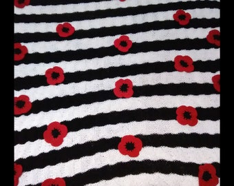 floral black and white striped blanket, knitted striped blanket with flowers, black and white blanket with red flowers, striped blanket