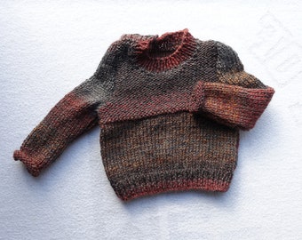 Baby boy chunky sweater, hand knitted in browns/greys acrylic yarn.  age approx 6-9 months, fits 18 in chest. One off item.