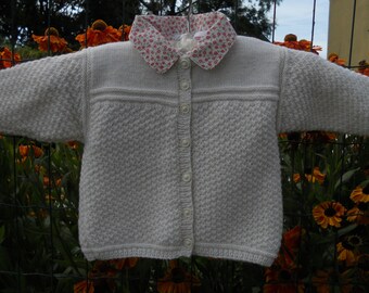 Baby girl/toddler hand knit cardigan. Wool yarn cream, classic style,  buttoned round neck,