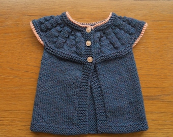 New born baby girl's hand knitted cardigan/jacket, in dark blue acrylic blend yarn with peach accents, to fit chest approx 14 in