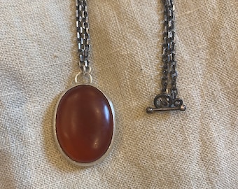 Deep matte carnelian stone pendant