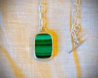 Classic Malachite Pendant with 24” sterling silver chain and setting.