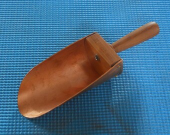Copper scoop. Made for enjoyment of the material and use. Excellent for scooping flour, sugar, coffee beans or even ice from your ice maker.