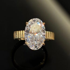 Vintage Inspired Oval Moissanite Engagement Ring: 18K Gold Ribbed Band