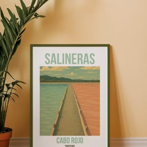 Può includere: Stampa artistica incorniciata raffigurante le saline di Cabo Rojo a Porto Rico. L'immagine mostra un sentiero tra acqua turchese e rosa, con la scritta "SALINERAS" in alto e "CABO ROJO" in basso, in una cornice verde.