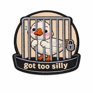 May include: Embroidered patch featuring a cartoon duck behind bars. The duck has a white body, orange beak and feet, and pink cheeks. The patch includes the text "got too silly" in white on a black banner.