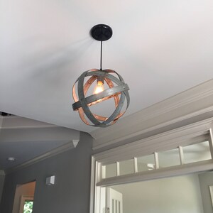 Wine Barrel Ring Pendant Light Atom Made from salvaged California wine barrel rings. 100% Recycled Black Canopy