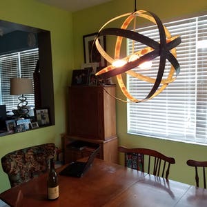 Wine Barrel Ring Chandelier Premier Made from retired California wine barrel rings 100% Recycled 22" Diameter inches