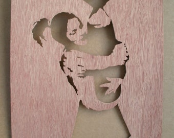 Banksy Girl Hugging Bomb Stencil