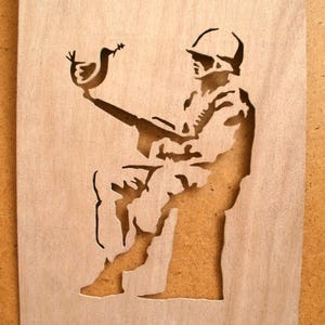 Banksy Soldier With Dove Stencil