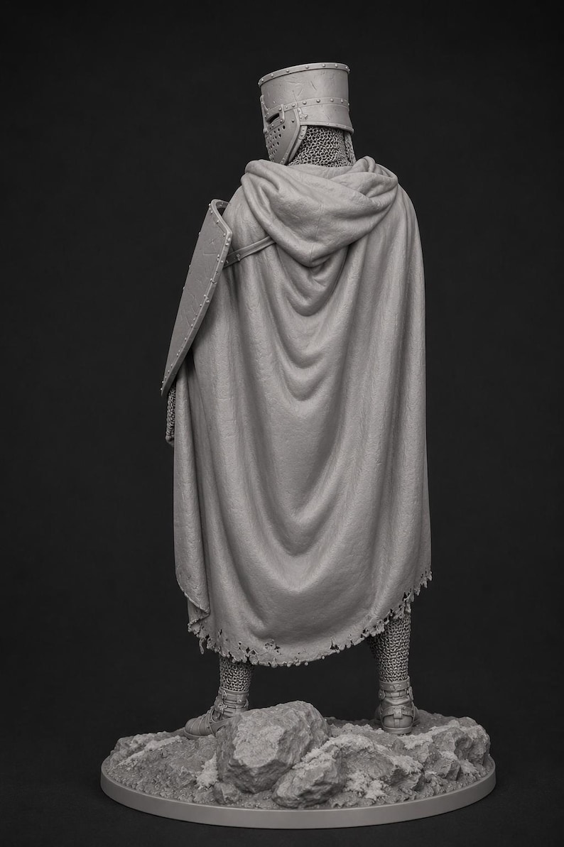 May include: A gray scale figurine of a knight wearing a flat-topped helmet, chainmail armor, and a hooded cloak with a frayed hem. The knight carries a shield on the left side and stands on a textured, rocky base against a dark background.