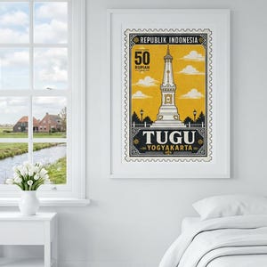 Könnte beinhalten: Ein gerahmter Kunstdruck im Design einer Briefmarke im Vintage-Stil. Die Grafik zeigt das Tugu Yogyakarta Denkmal in Gelb und Schwarz, wobei der Text REPUBLIK INDONESIA, 50 RUPIAH und TUGU YOGYAKARTA deutlich zu erkennen ist.