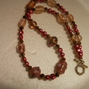 pearl and crystal necklace with vintage  lampwork glass beads