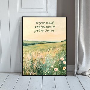 May include: Framed art print featuring a serene landscape with a field of wildflowers under a soft, yellow sky. The artwork includes the text: "To grow, a child must feel accepted just as they are."