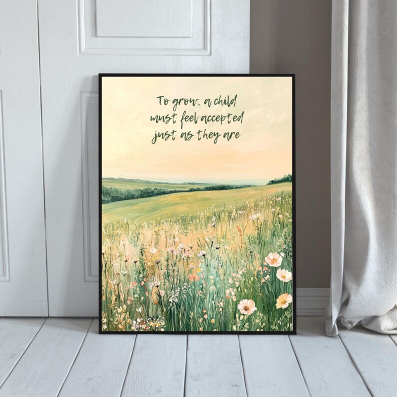 May include: Framed art print featuring a serene landscape with a field of wildflowers under a soft, yellow sky. The artwork includes the text: "To grow, a child must feel accepted just as they are."