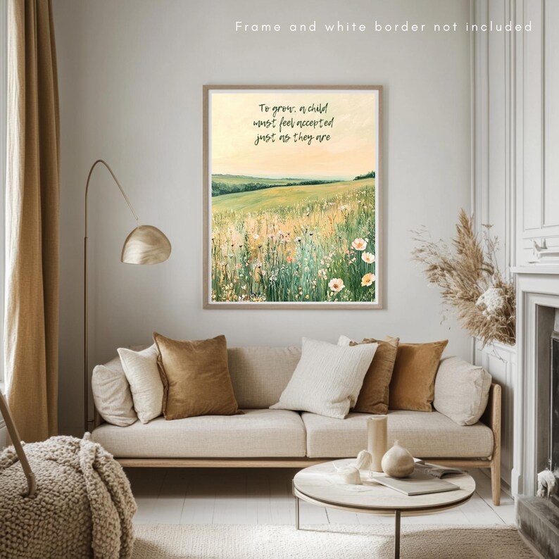 May include: A framed art print with a landscape scene of a field of wildflowers and rolling hills. The print includes the text "To grow: a child must feel accepted just as they are."