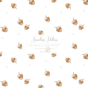 May include: A seamless pattern featuring watercolor illustrations of acorns in shades of brown and beige, scattered across a white background. The design includes the text "Seamless Pattern" and "High Resolution 300 DPI".